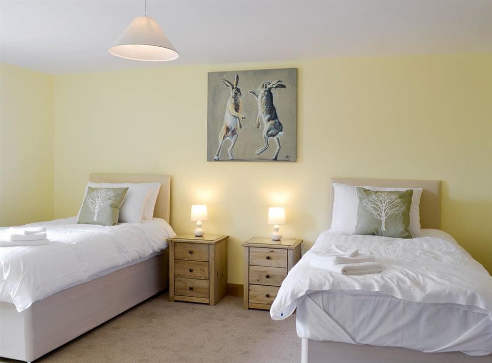 Good-sized twin bedroom at Llofft Storws, 