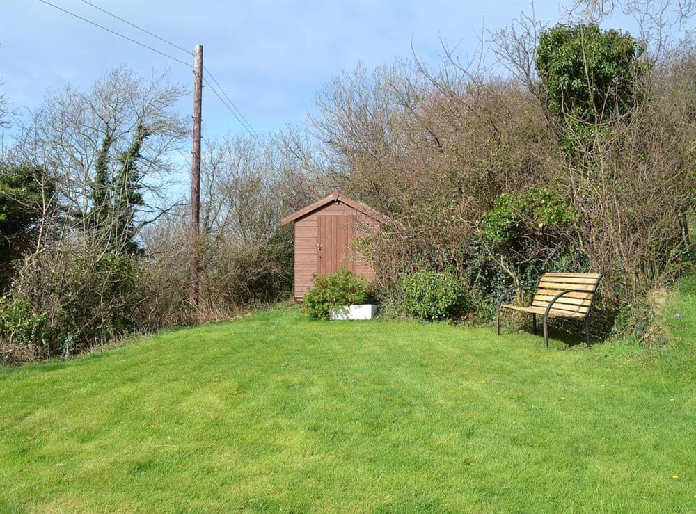 The lawned garden is a sun trap at Bronwerydd in near Clynnog Fawr, Gwynedd, Wales