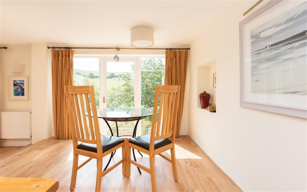 Relax in the living area at Brook Cottage in Bantham