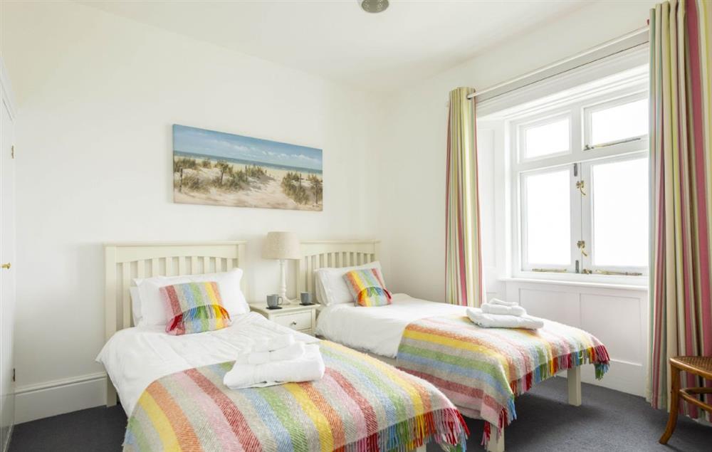 Bedroom with twin 3’ single beds at Brook Cottage (Cornwall), Trevose Head Lighthouse