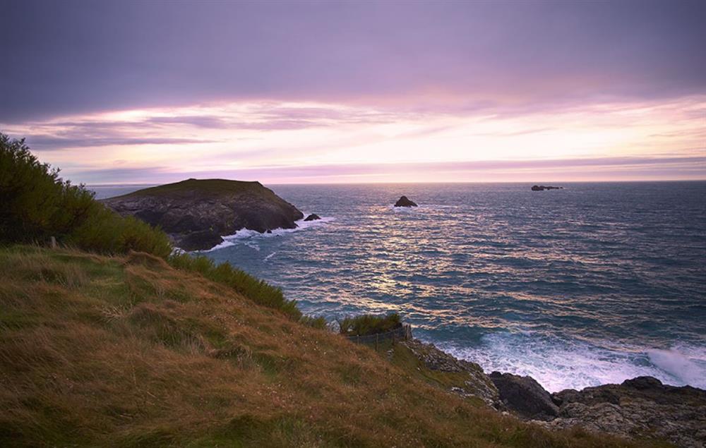 the four cottages are sheltered beneath a headland and are 75’ above the sea, accessed via a one-mile-long private road
