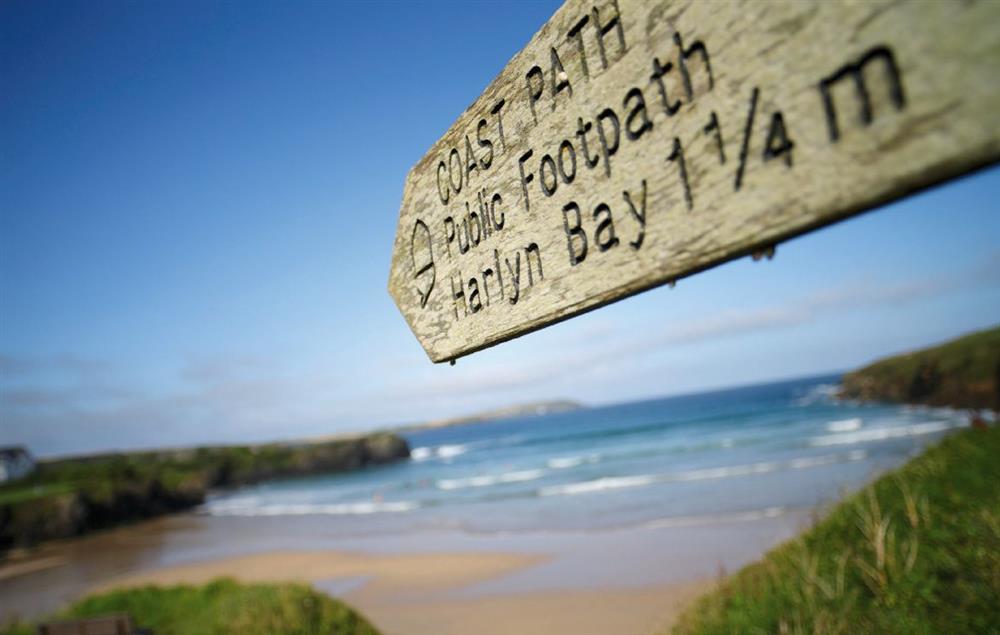 The South West Coast Path runs around the headland and on towards Padstow