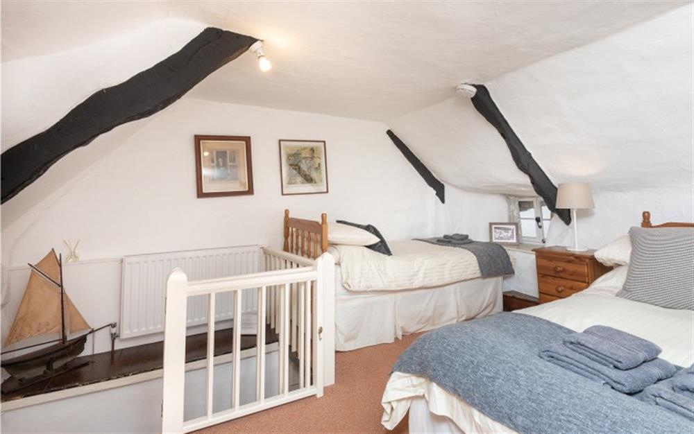 Double and single bed (with pull out). at Brook Cottage in Hope Cove