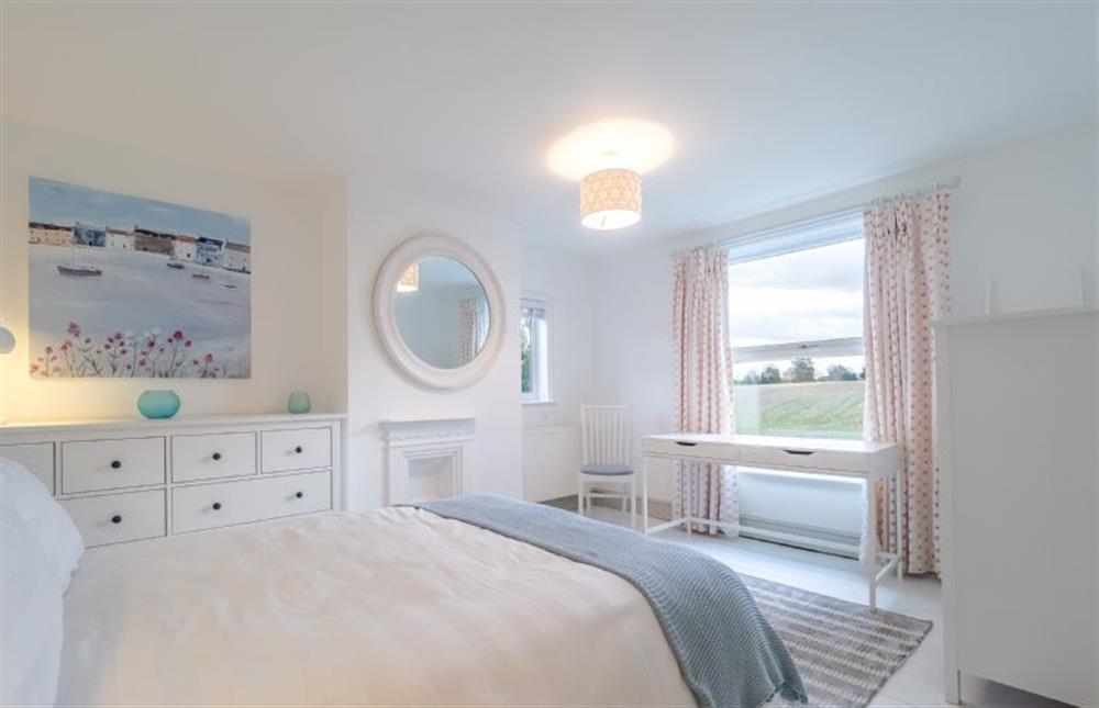 First floor: Lovely views from the master bedroom at Brook House, Brinton near Melton Constable