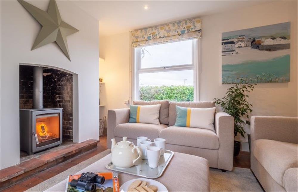 Ground floor: Comfortable cosy sitting room at Brook House, Brinton near Melton Constable