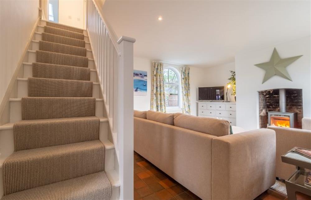 Ground floor: Stairs lead from the sitting room at Brook House, Brinton near Melton Constable