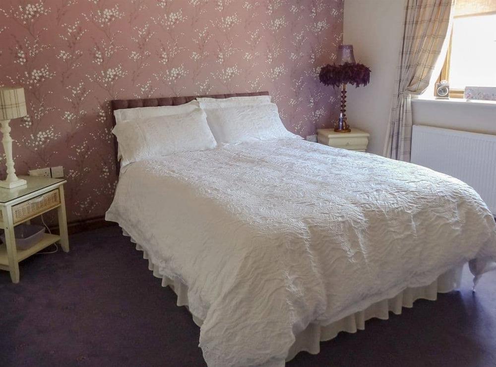 Comfortable double bedroom at Brook Lodge Country Cottage in Wroot, near Doncaster, South Yorkshire