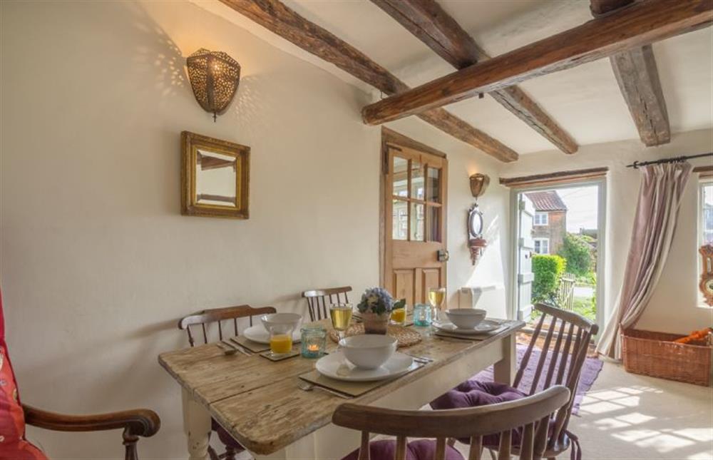 Ground floor: Dining area with seating at Brooke Cottage, Great Walsingham