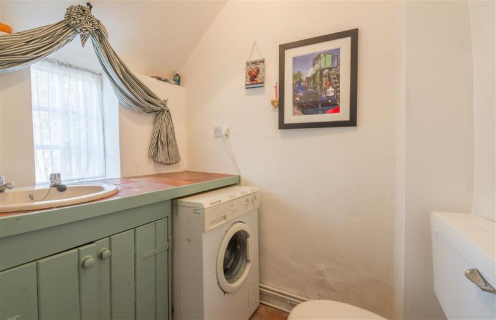 Ground floor: Utility room with WC