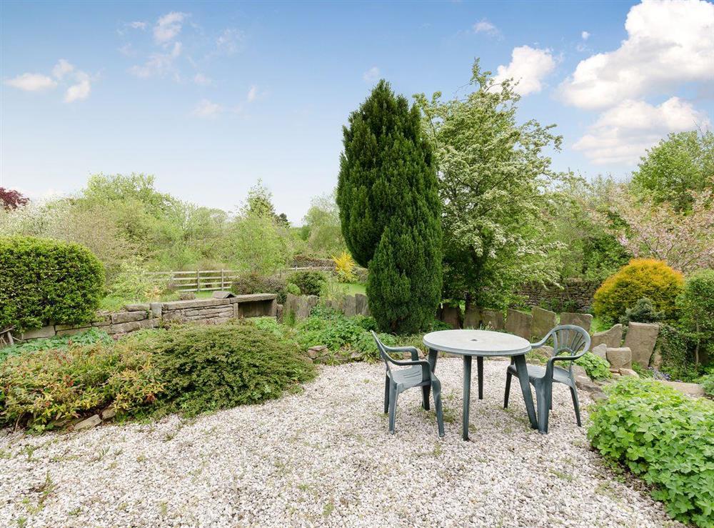 Outdoor seating area & garden at Brookside Cottage in Beeley, near Chatsworth, Derbyshire