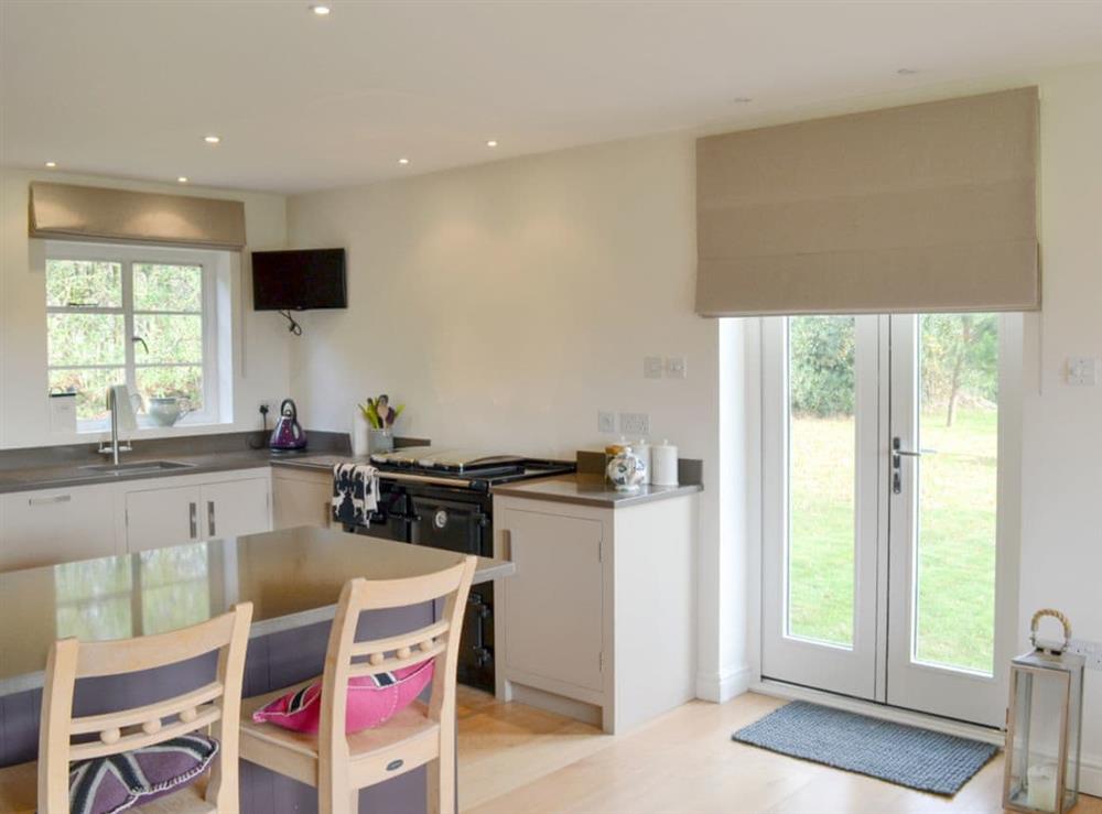 Light and airy kitchen/ dining room at Brookside Cottage in Burley, near Ringwood, Hampshire