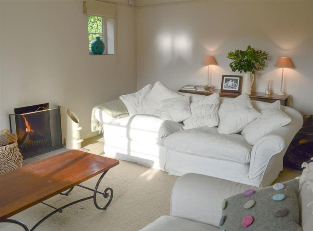 Spacious, comfortable living room (photo 2) at Brookside Cottage in Burley, near Ringwood, Hampshire