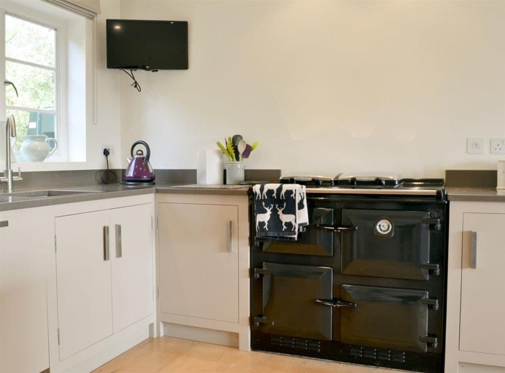 Well equipped kitchen at Brookside Cottage in Burley, near Ringwood, Hampshire