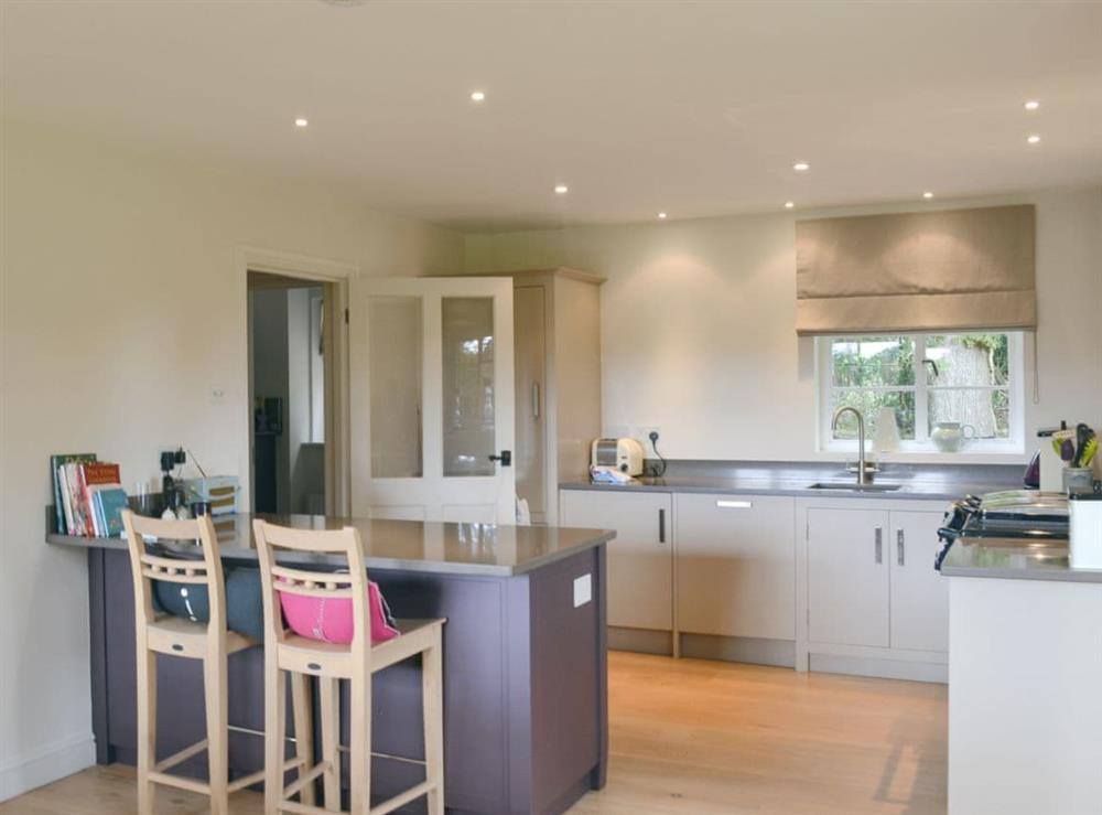 Well presented kitchen area at Brookside Cottage in Burley, near Ringwood, Hampshire