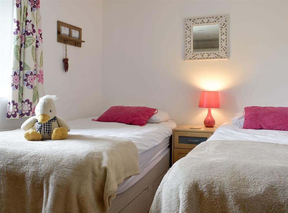 Good-sized twin bedroom at Brookside in Langthwaite, near Reeth, North Yorkshire