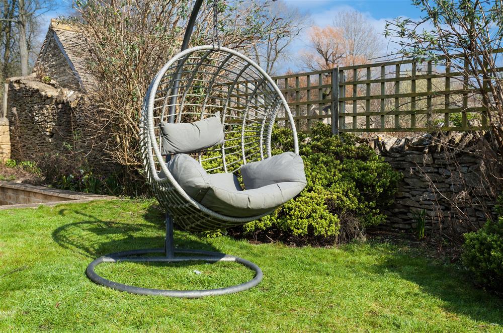 Brookview, Cotswolds: Egg chair in the garden at Brookview, Lower Swell, Nr Stow-on-the-Wold