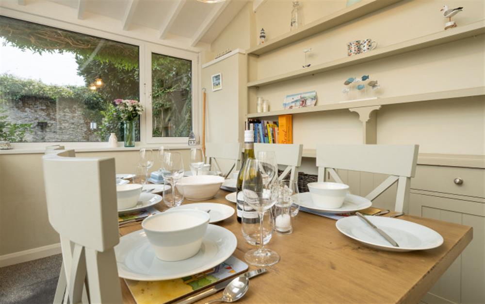 Light and airy dining to enjoy a delicious meal. at Broome Cottage in Stoke Fleming