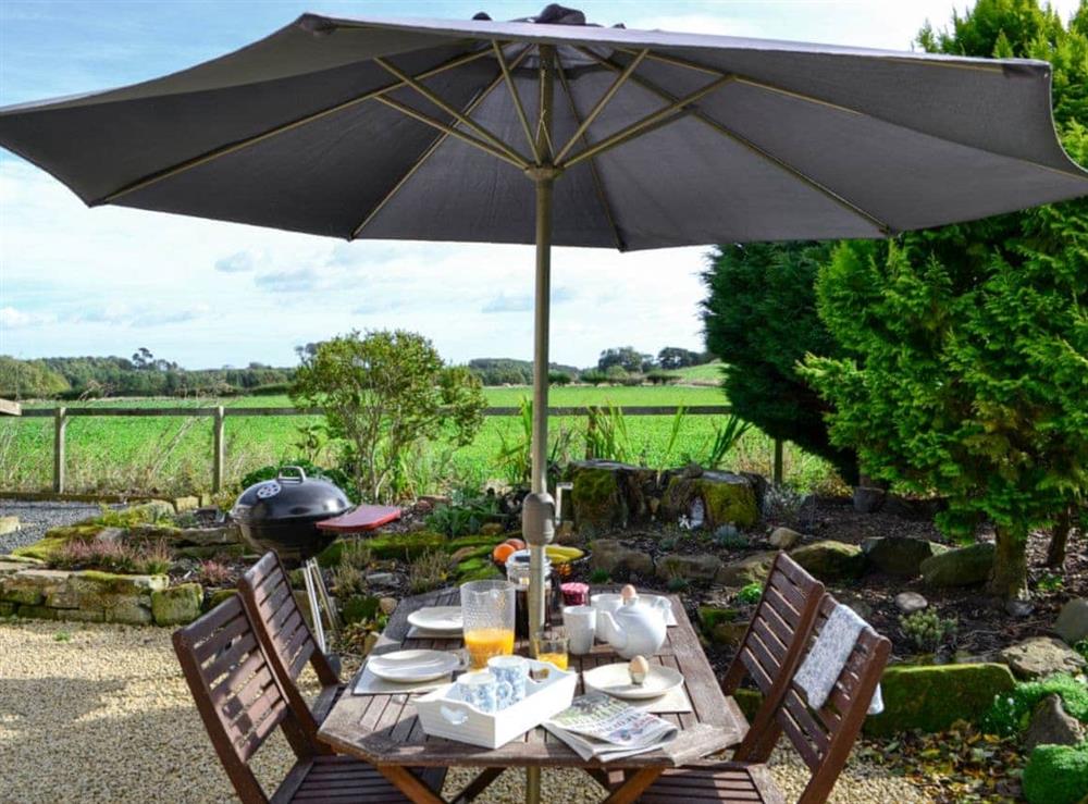 Outdoor dining area at Broomhouse Lodge in Edrom, near Duns, The Scottish Borders, Berwickshire