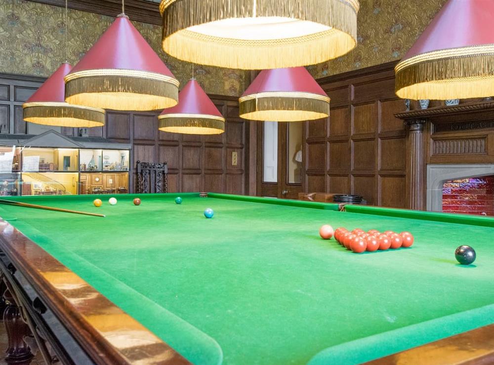 Classically styled billiards room with full size snooker table at Broughton Hall in Broughton, near Skipton, North Yorkshire