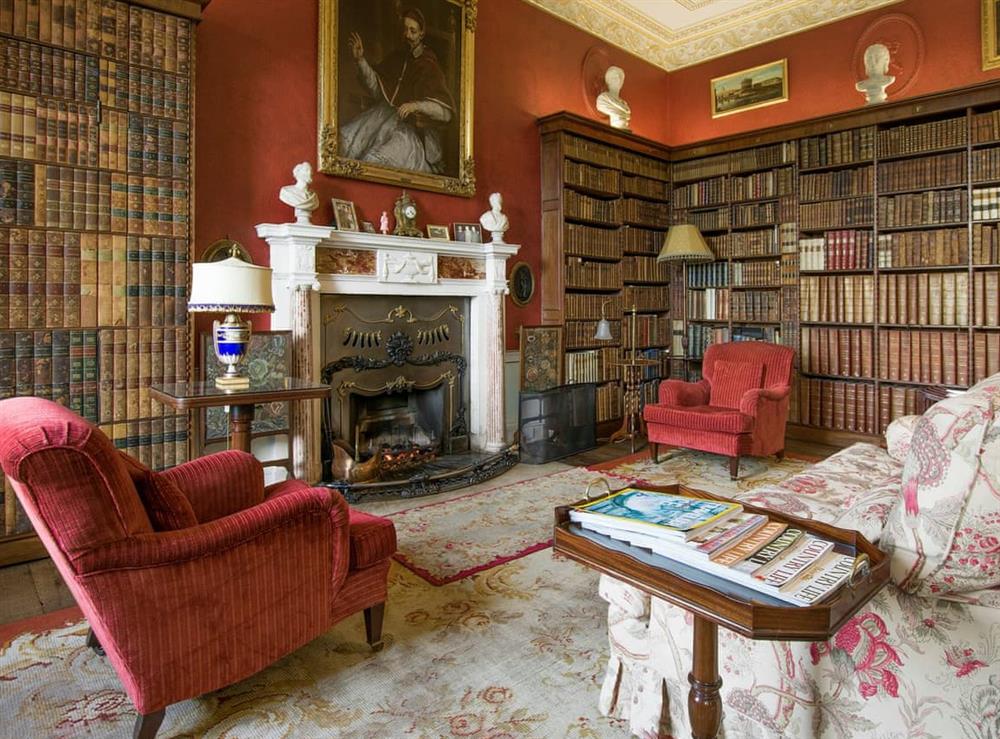 Relaxing seating area within the library at Broughton Hall in Broughton, near Skipton, North Yorkshire