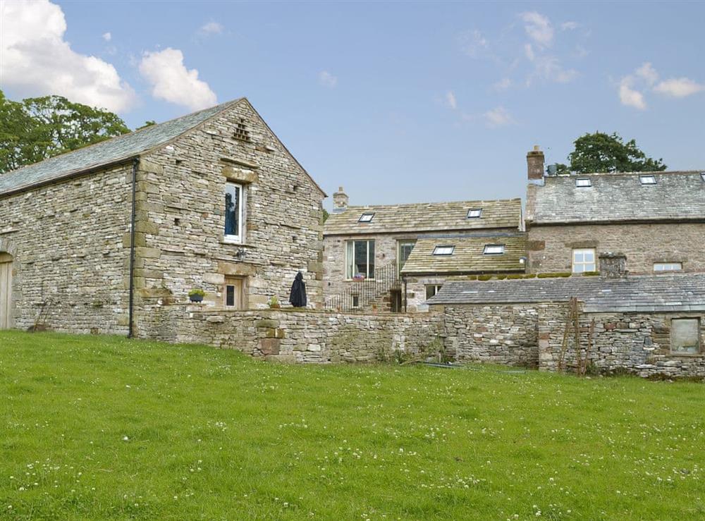 Delightful stone barn nestling amongst similar farm properties