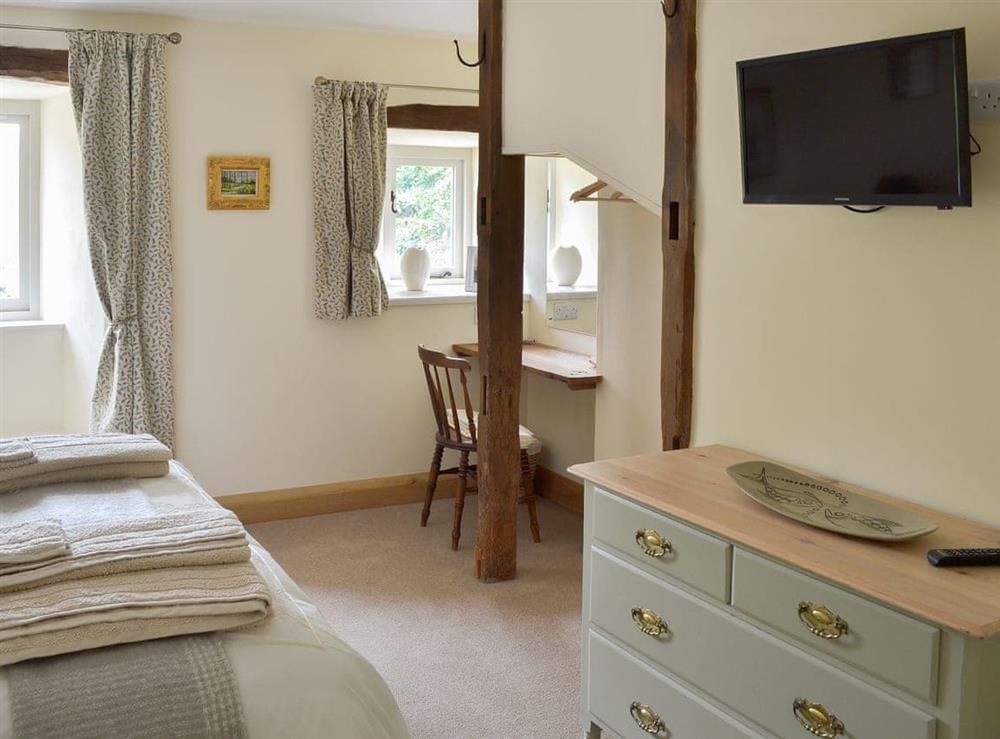 Double bedroom with pull-out children’s single bed at Brow View Cottage in Ravenstonedale, near Kirkby Stephen, Cumbria