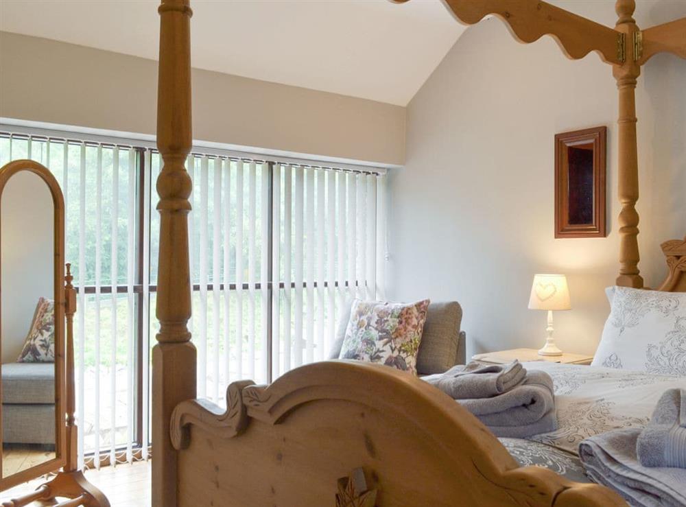 Peaceful double bedroom at Lilly Cottage, 