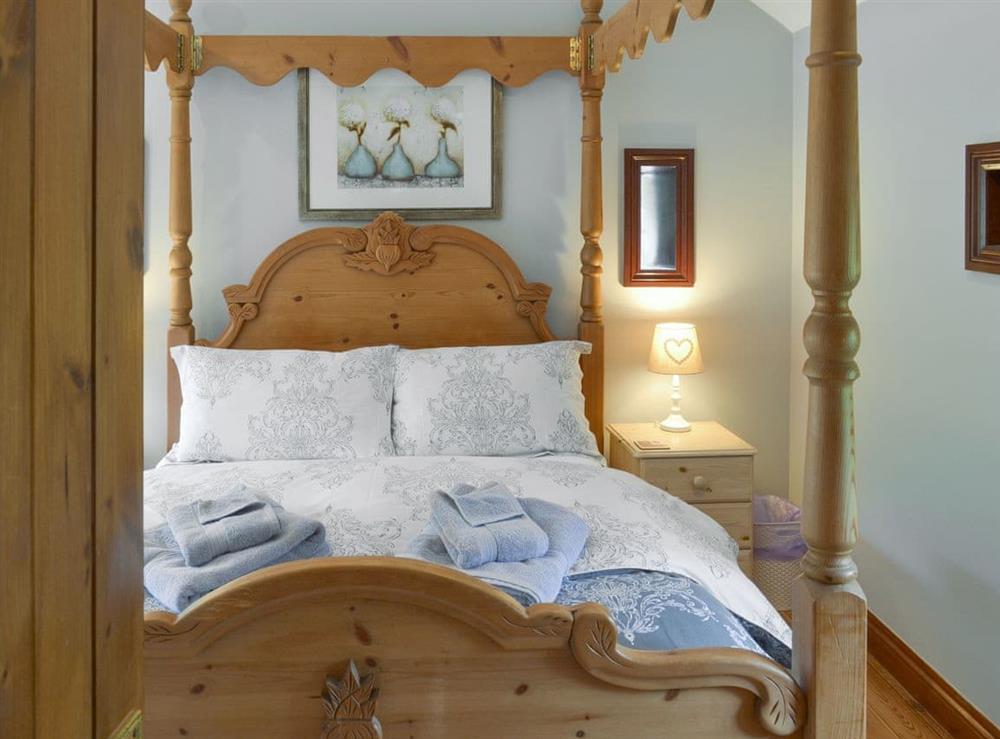 Stylish double bedroom at Lilly Cottage, 