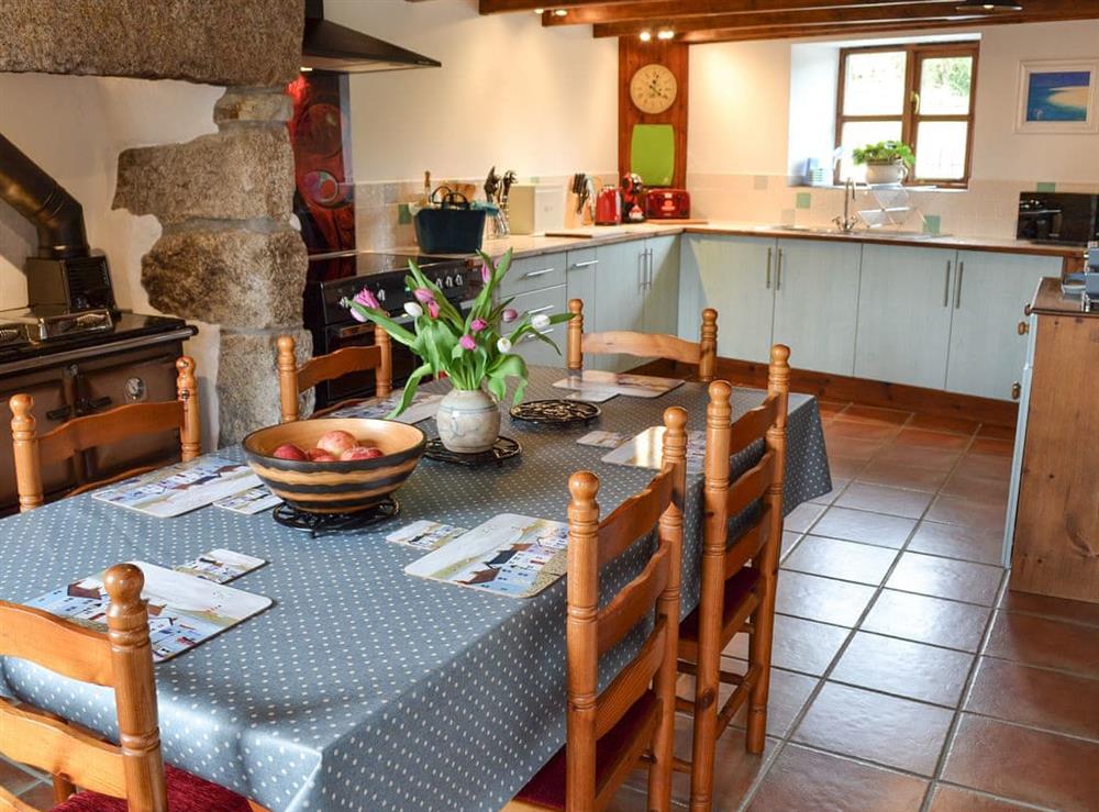 Kitchen with dining area at Bruces Cottage in Whitecross, near Marazion, Cornwall