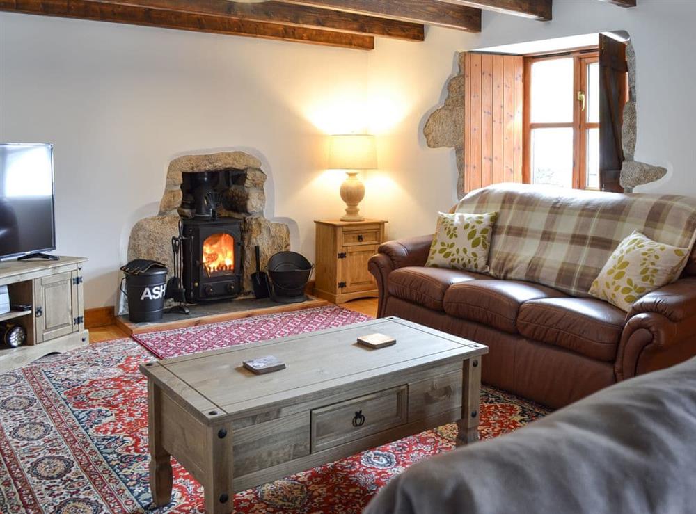 Lovely, cosy living room with wood burner at Bruces Cottage in Whitecross, near Marazion, Cornwall