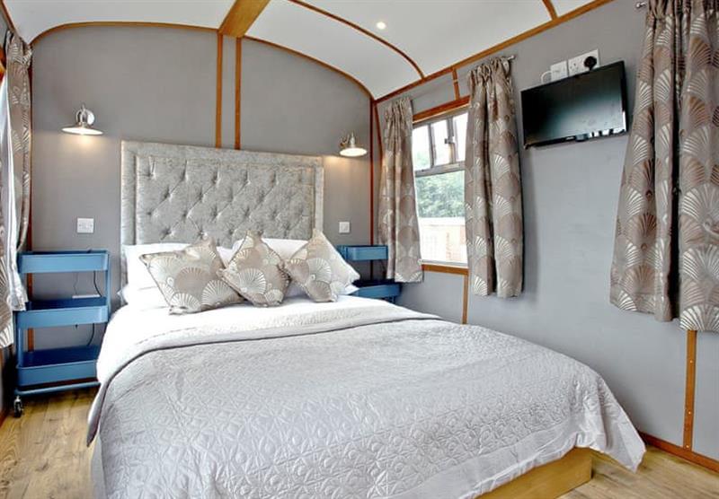 Bedroom in Brunel Boutique Railway Carriage 1 at Brunel Boutique Holiday Park in Dawlish Warren, South Devon