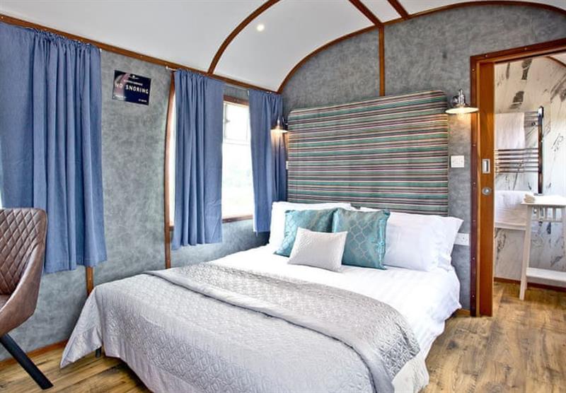 Bedroom in Brunel Boutique Railway Carriage 4 at Brunel Boutique Holiday Park in Dawlish Warren, South Devon