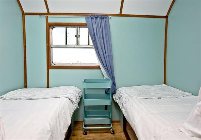 Twin bedroom in Brunel Boutique Railway Carriage 5 at Brunel Boutique Holiday Park in Dawlish Warren, South Devon