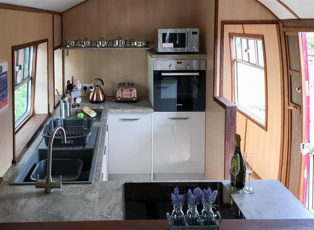 Typical open plan living space at Brunel Boutique Railway Carriage No 5 in Dawlish Warren, Devon