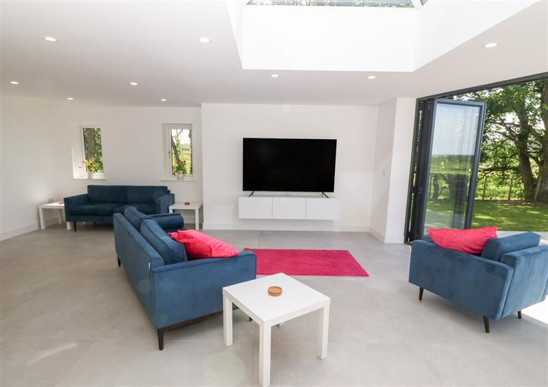 Relax in the living area at Bryn Aber, Newborough