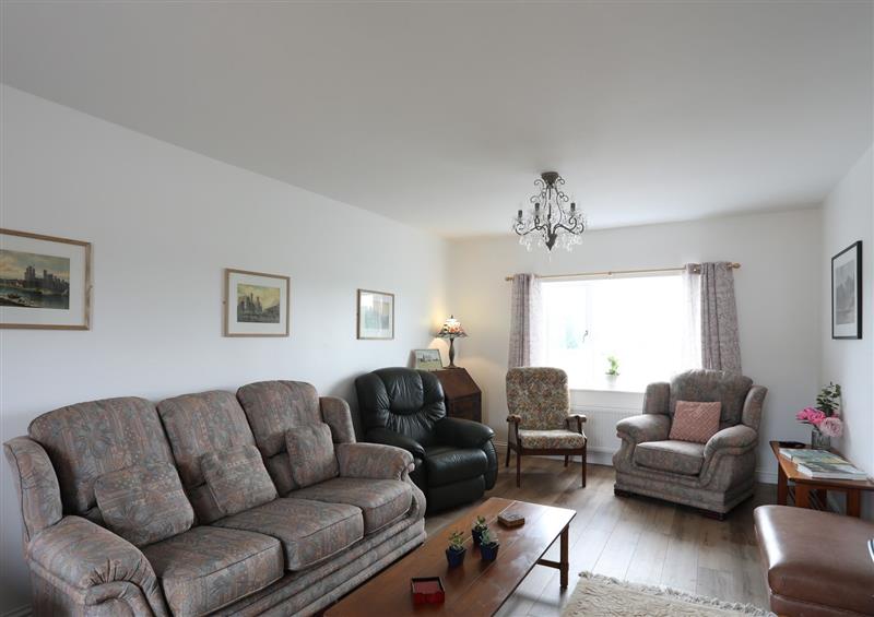 Enjoy the living room at Bryn Afon Farm, Llanrug