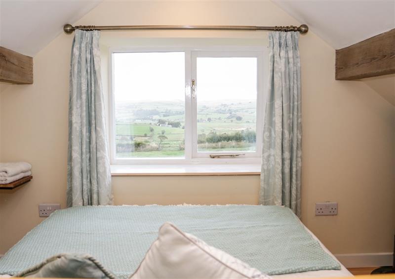 A bedroom in Bryn Dedwydd Cottage at Bryn Dedwydd Cottage, Pentrefoelas