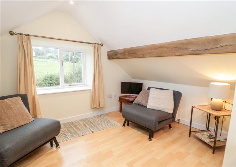 Enjoy the living room (photo 2) at Bryn Dedwydd Cottage, Pentrefoelas