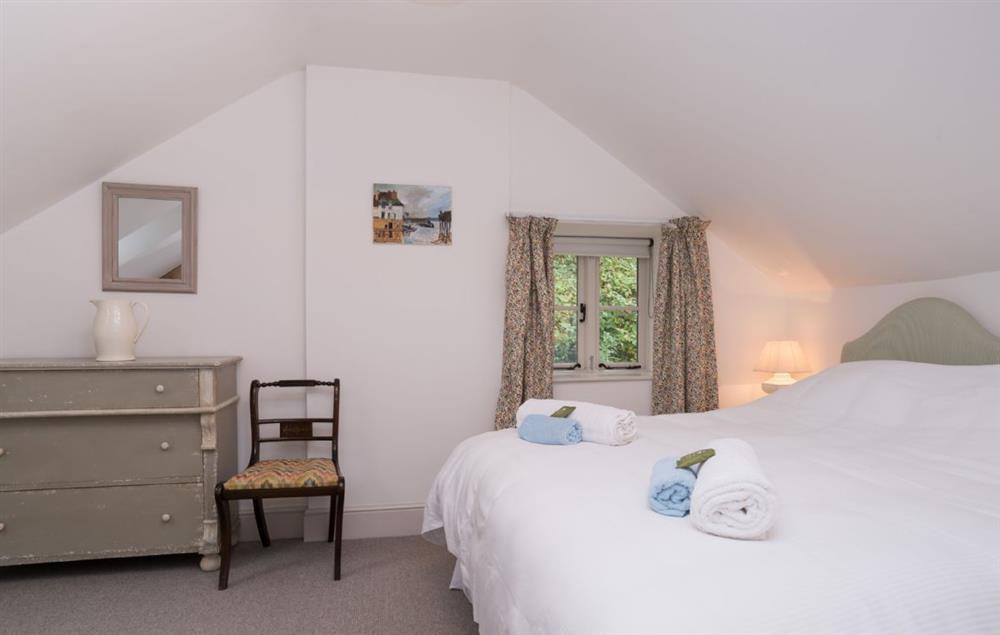Double bedroom with 6’ king size zip and link beds and en-suite bathroom (photo 2) at Bryn Derw, Bodnant Estate