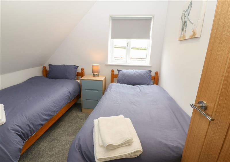 This is a bedroom at Bryn Eglwys Bach, Penmynydd near Llanfairpwllgwyngyll