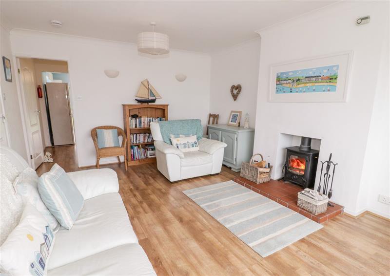 Relax in the living area at Bryn Eithin, Red Wharf Bay