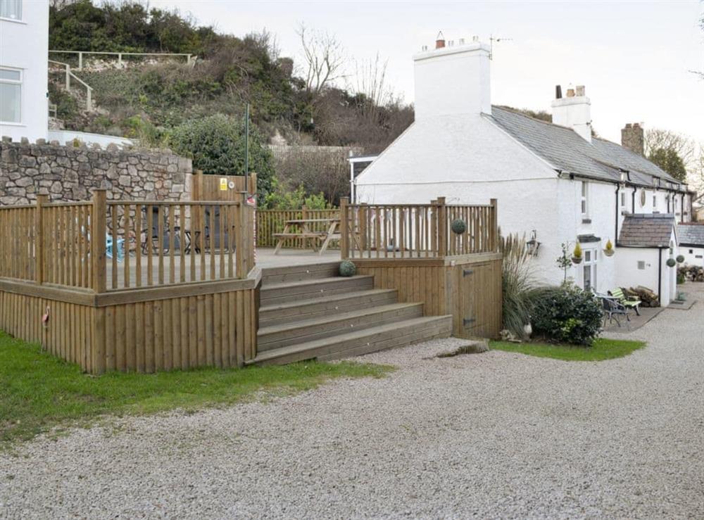 Large raised decked patio at Bryn Euryn Cottage in Rhos-on-Sea, near Colwyn Bay, Conwy