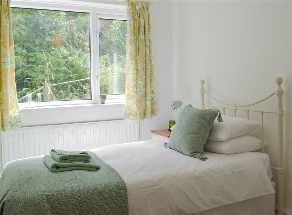 Comfy bedroom at Bryn Heulog in Penclawdd, near Swansea, West Glamorgan