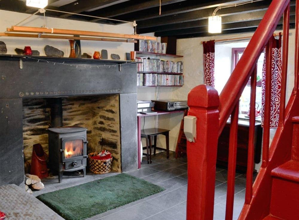 Cosy living room with wood burner at Bryn Rhosgoch in Cwm Penmachno, near Betws-y-Coed, Gwynedd
