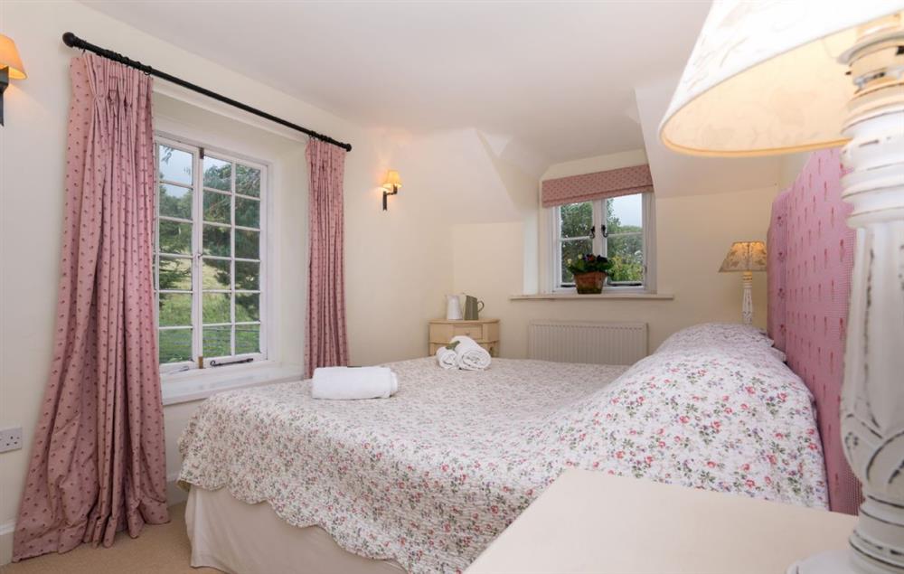 Double bedroom with king size zip and link beds (can be converted into twin beds on request) (photo 2) at Bryn Rhydd, Bodnant Estate