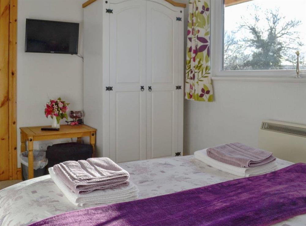 The double bedroom is well decorated and furnished to a high standard at Bryn Rodyn in Graigfechan, near Ruthin, Denbighshire