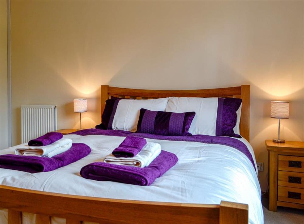 Comfortable bedroom with kingsize bed (photo 2) at Bryn Villa in Howey, near Llandrindod Wells, Powys