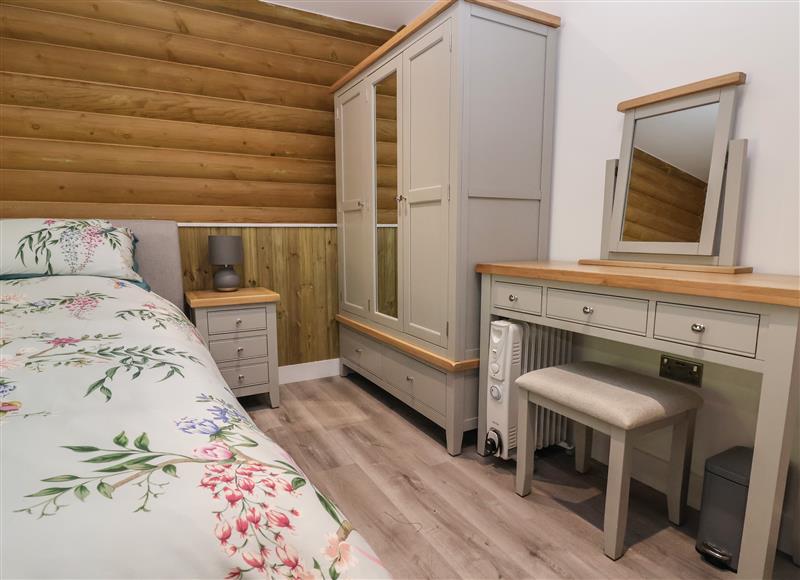 This is the bedroom at Brynallt Country Park Redwood Lodge, Frankton near Ellesmere