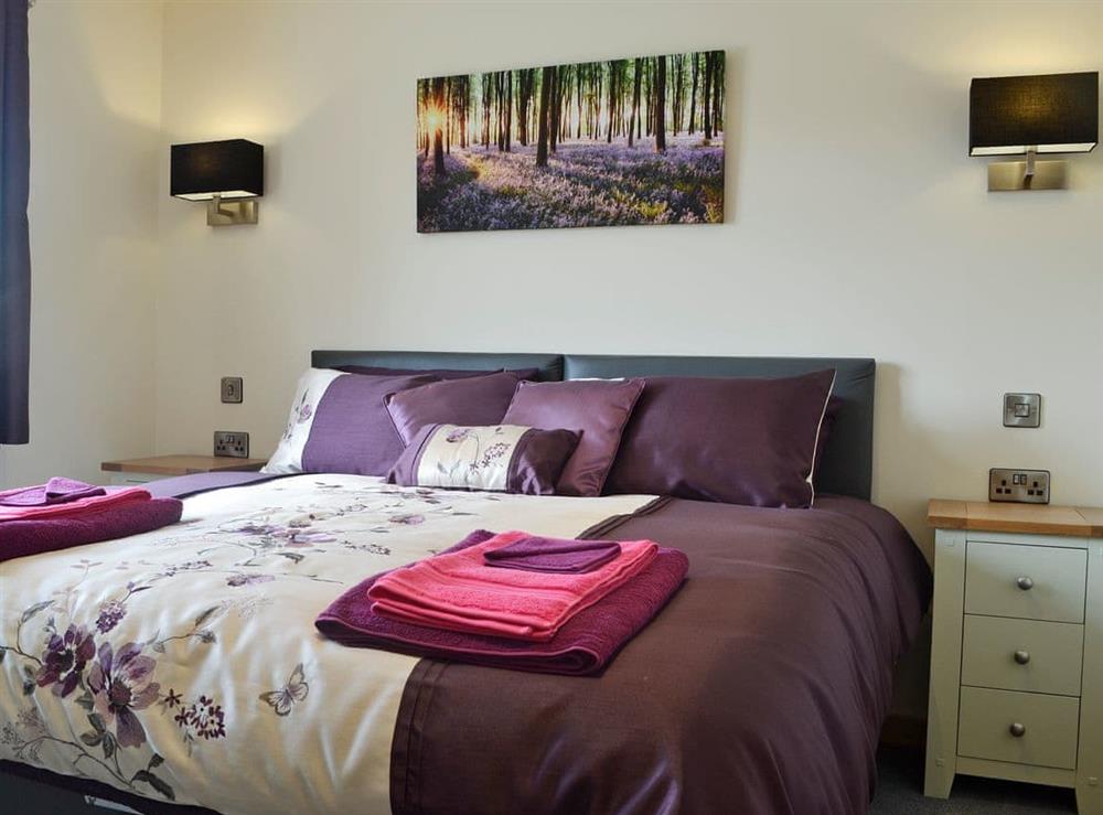 Sumptuous double bedroom at Woodland Lodge, 