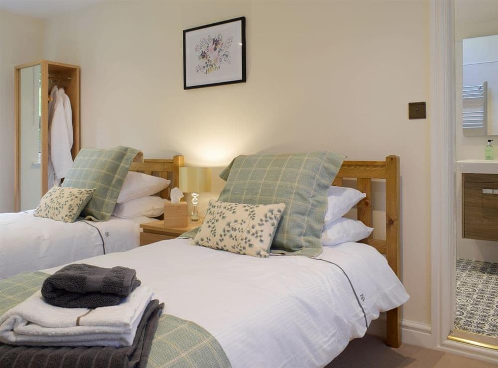 Twin bedroom at Brynderwen Hall Annexe in Llanfyllin, Powys